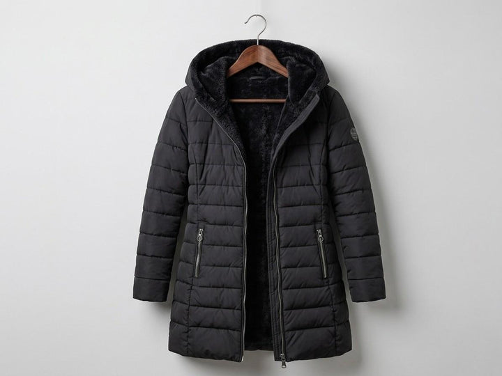 Quilted A-line winter coat in black with hood, full-zip front, two side zip pockets