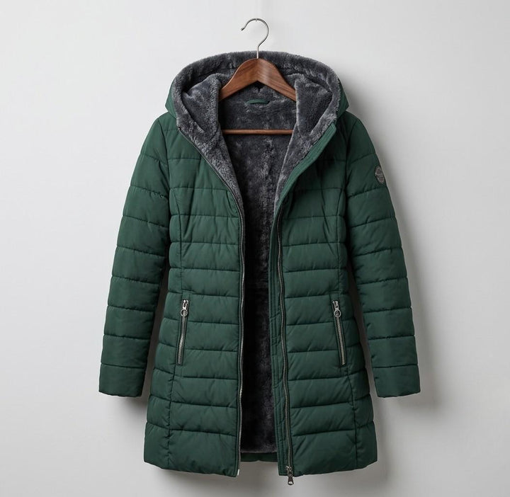 Dark green quilted A-line winter coat with hood and full zip, side zip pockets.