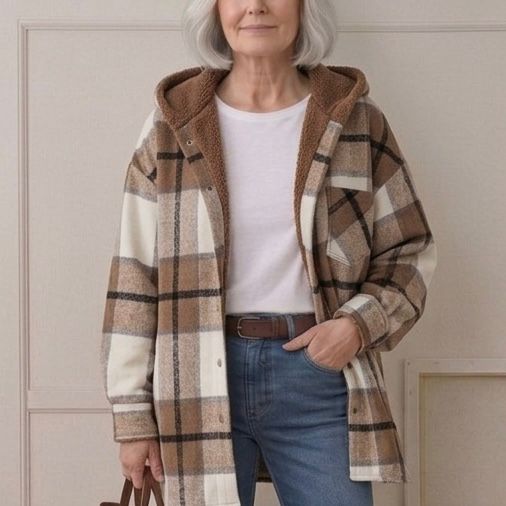 Hooded flannel shacket on model: tan-and-brown plaid with brown sherpa hood