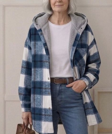 Hooded flannel shacket in blue and white plaid with gray sherpa hood lining and pockets