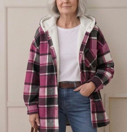 Hooded flannel shacket in burgundy, black, and cream plaid with snap front and pockets