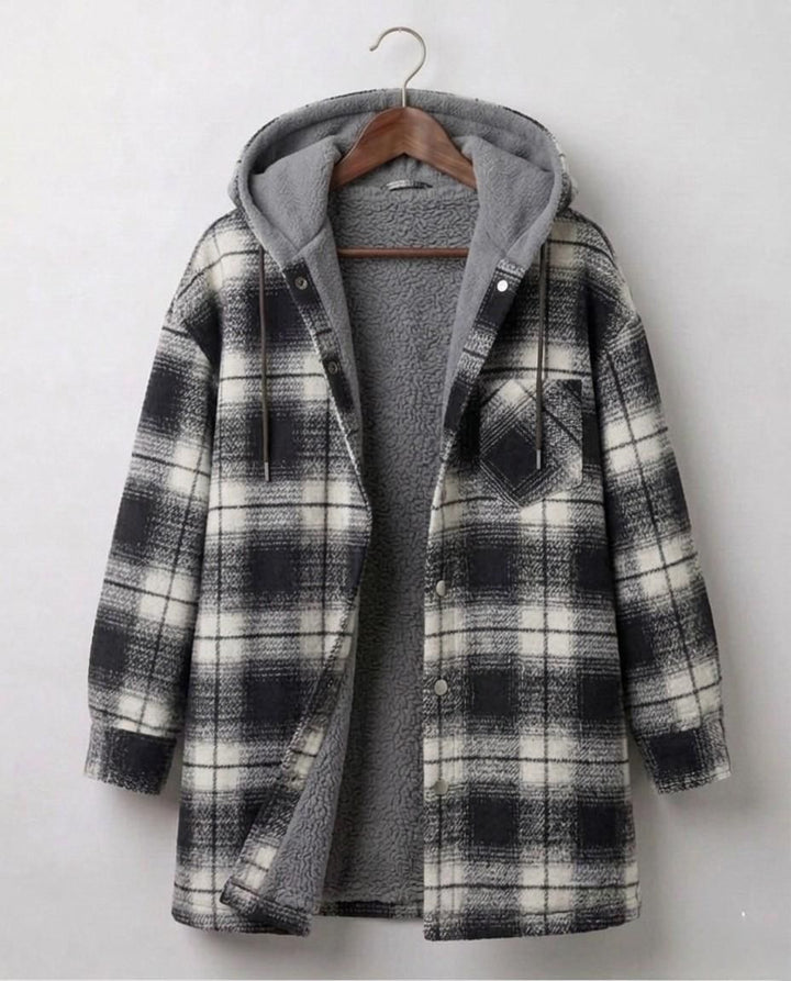 Hooded flannel shacket in black-and-white plaid with dark gray sherpa lining