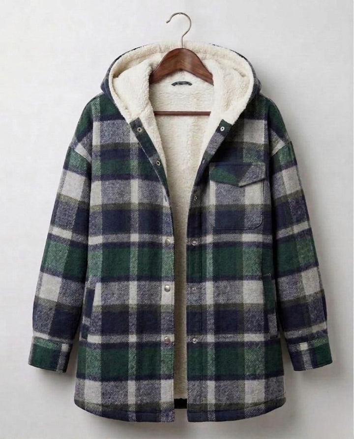 Hooded flannel shacket on hanger in green and cream plaid with cream sherpa hood lining