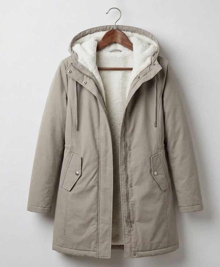 Waterproof long parka with hood, light taupe outer shell, sherpa lining, zip front.