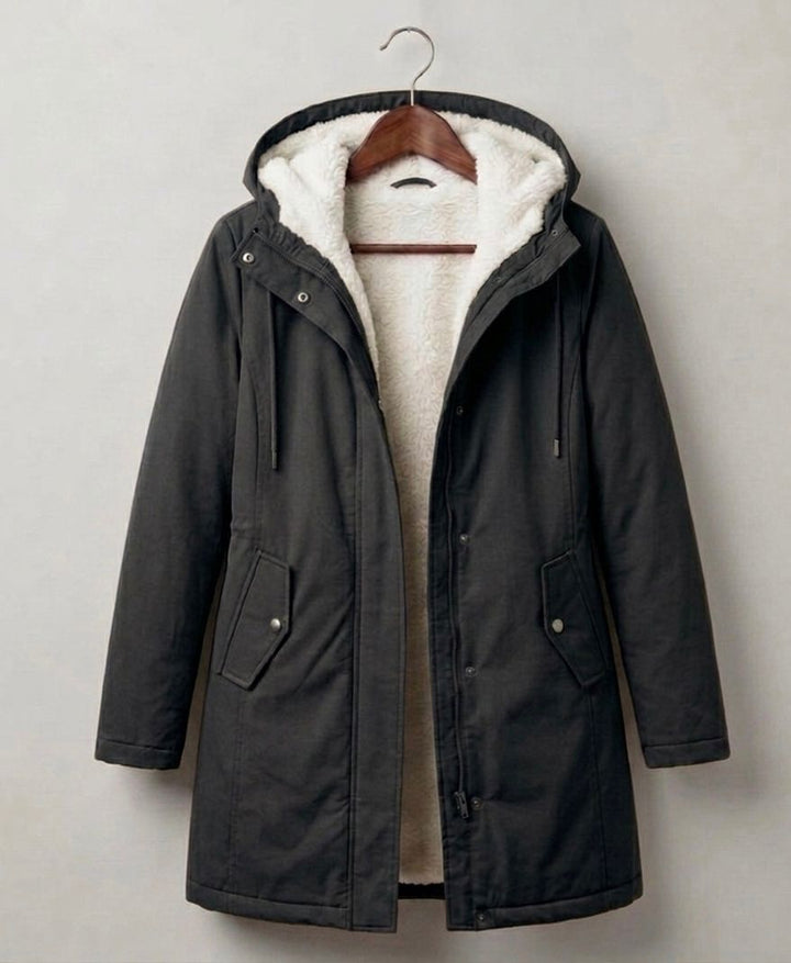 Black waterproof long parka with sherpa-lined hood and front zip