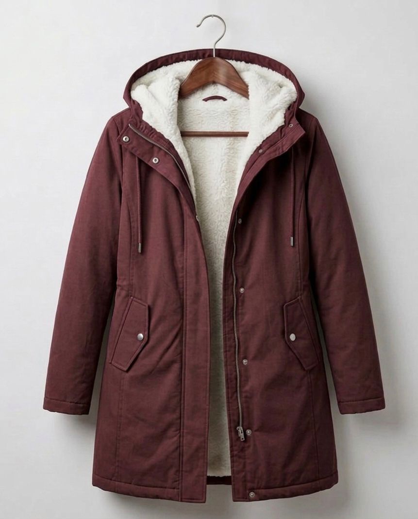 Burgundy waterproof long parka with sherpa-lined hood and zip front