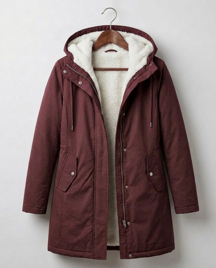 Burgundy waterproof long parka with sherpa-lined hood and zip front