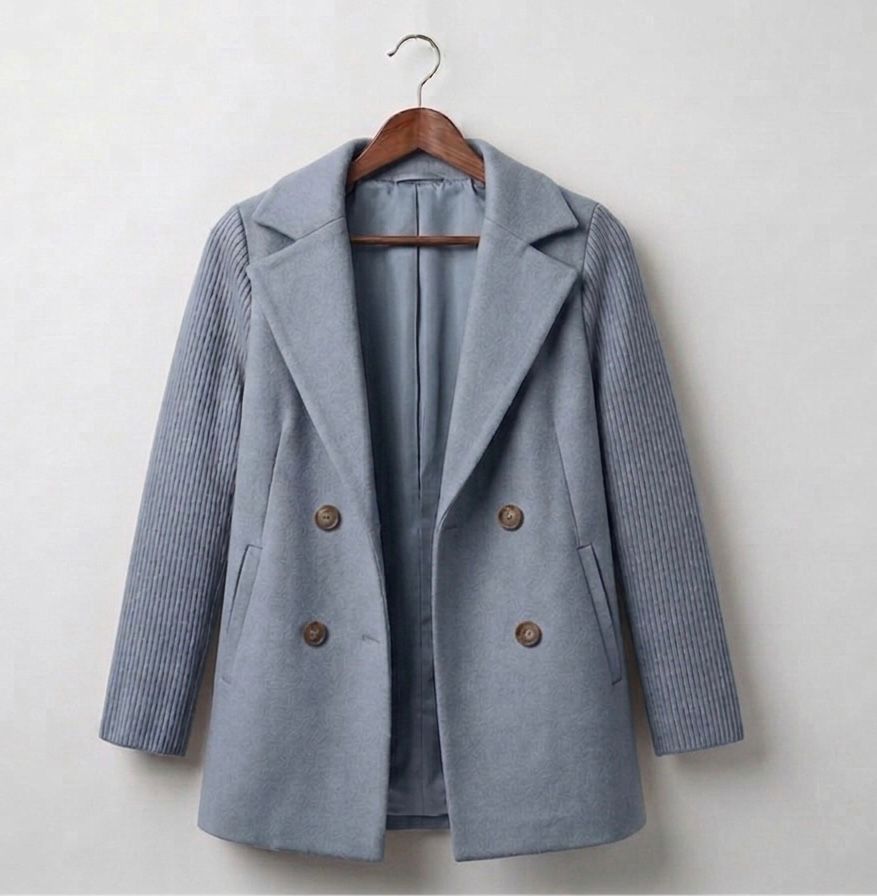 Light grey ribbed blazer coat with notched lapels and four-button front