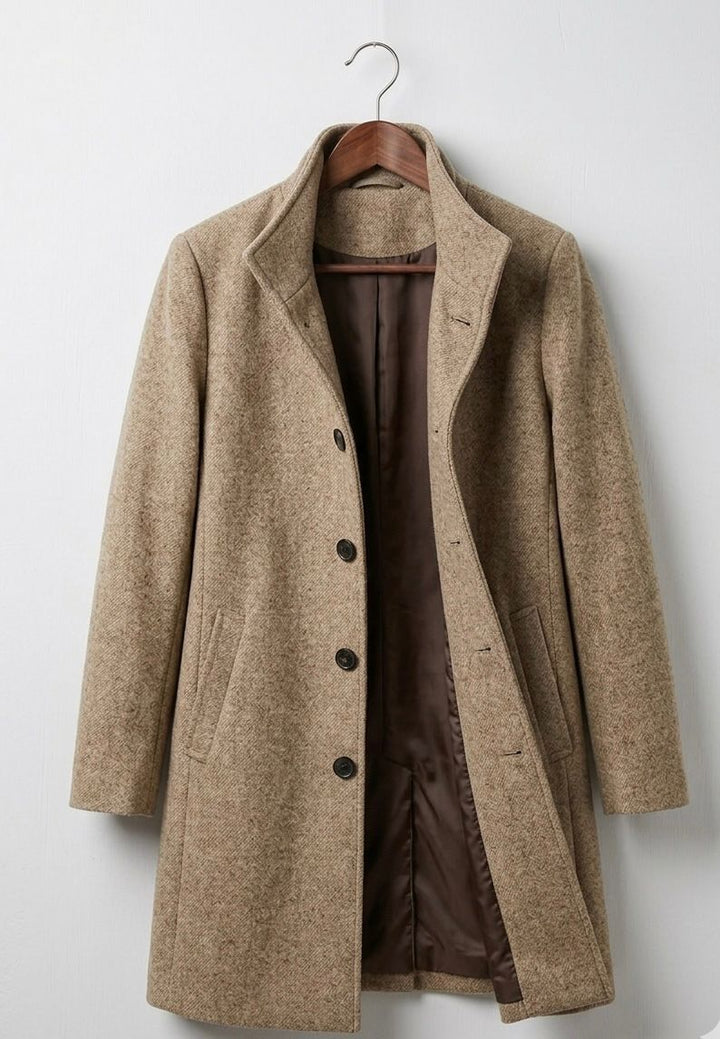 Beige long wool coat with notched lapels, button front, and side pockets