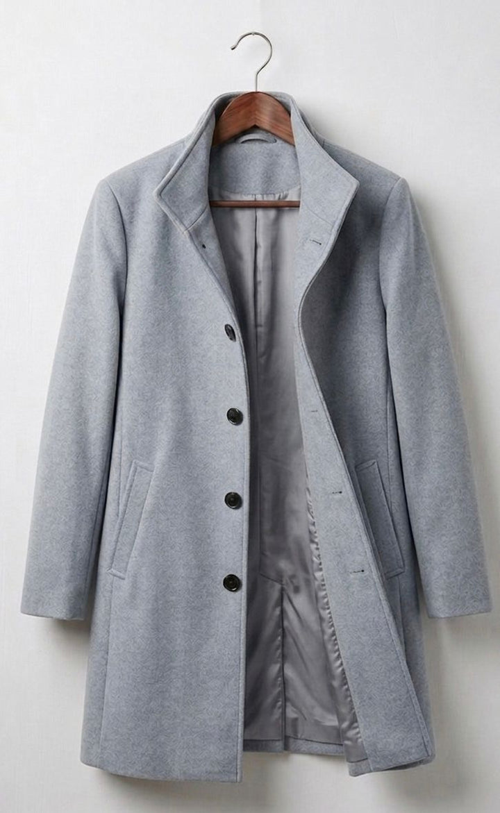 Light grey long wool coat with notched lapels, button front, and side pockets