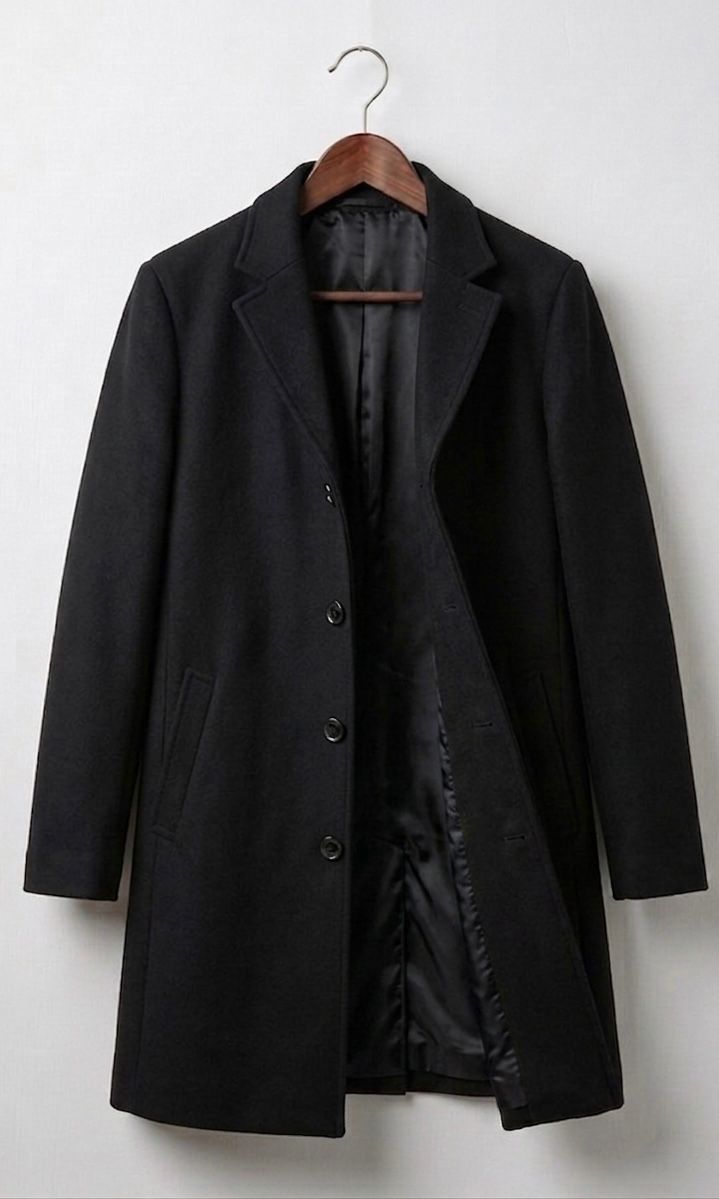 Black long wool coat with notched lapels, button front, and side pockets