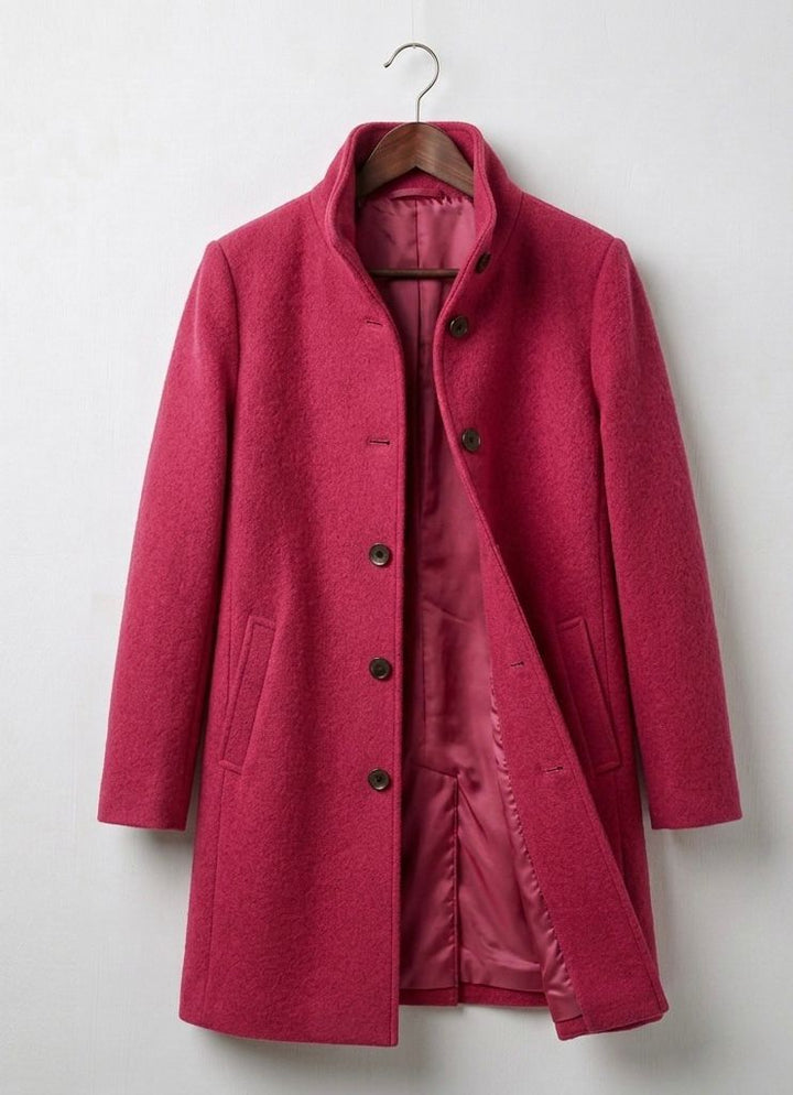 Pink long coat with notch lapels, front button closure, and lined interior