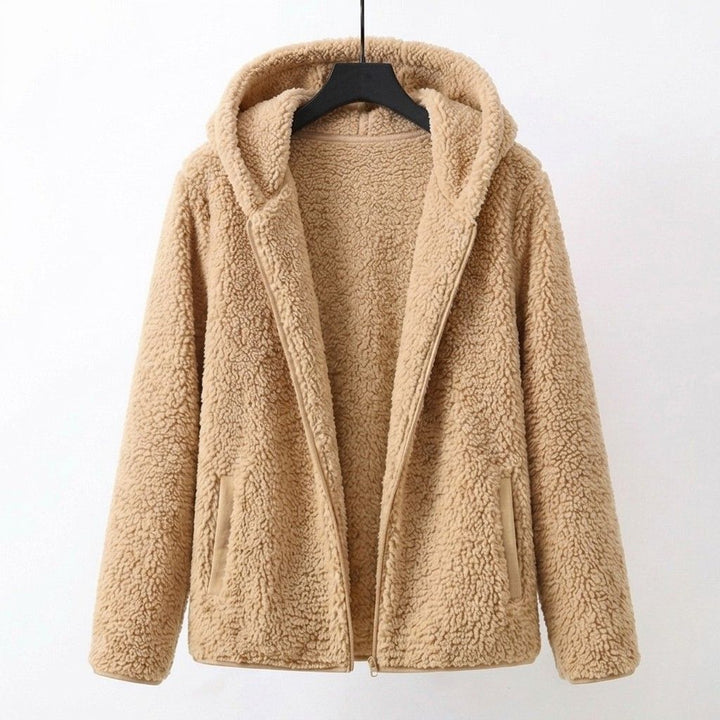 Beige sherpa hooded coat with zip front and fuzzy teddy texture