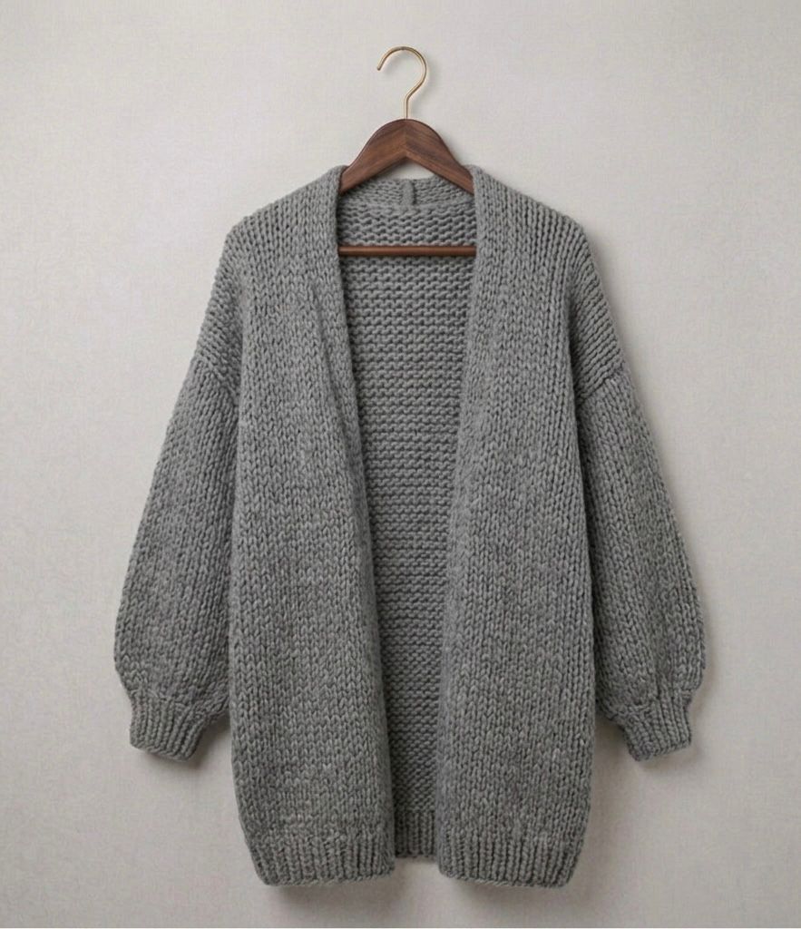 Grey relaxed knit cardigan with open front, textured knit, and ribbed hem and cuffs