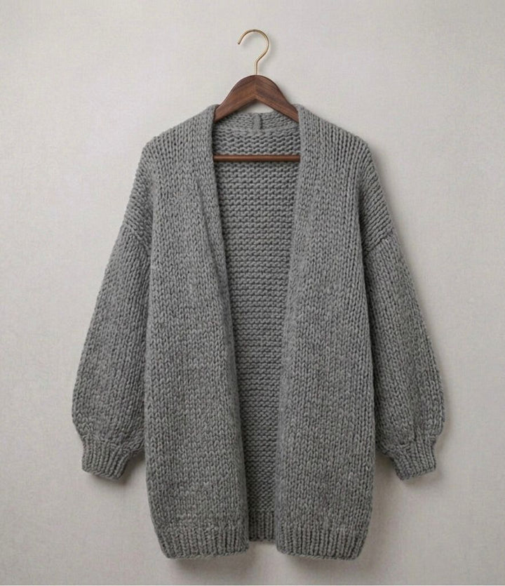 Grey relaxed knit cardigan with open front, textured knit, and ribbed hem and cuffs