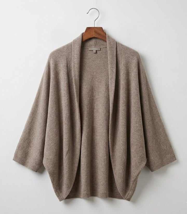 Merino wool shawl in taupe, draped open-front style with wide folds