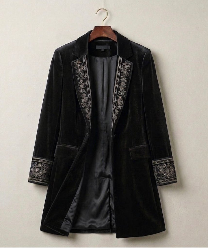 Black velvet statement blazer with ornate embroidered trim and satin inner lining