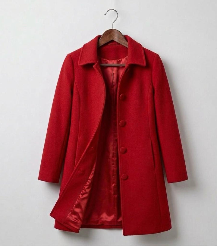 Red mid-length coat with notched lapel and button front, fully lined.