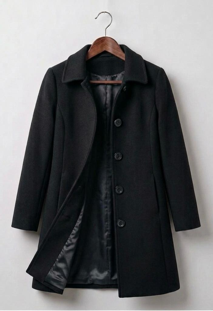 Black mid-length coat with notched lapel, button front, and satin lining.
