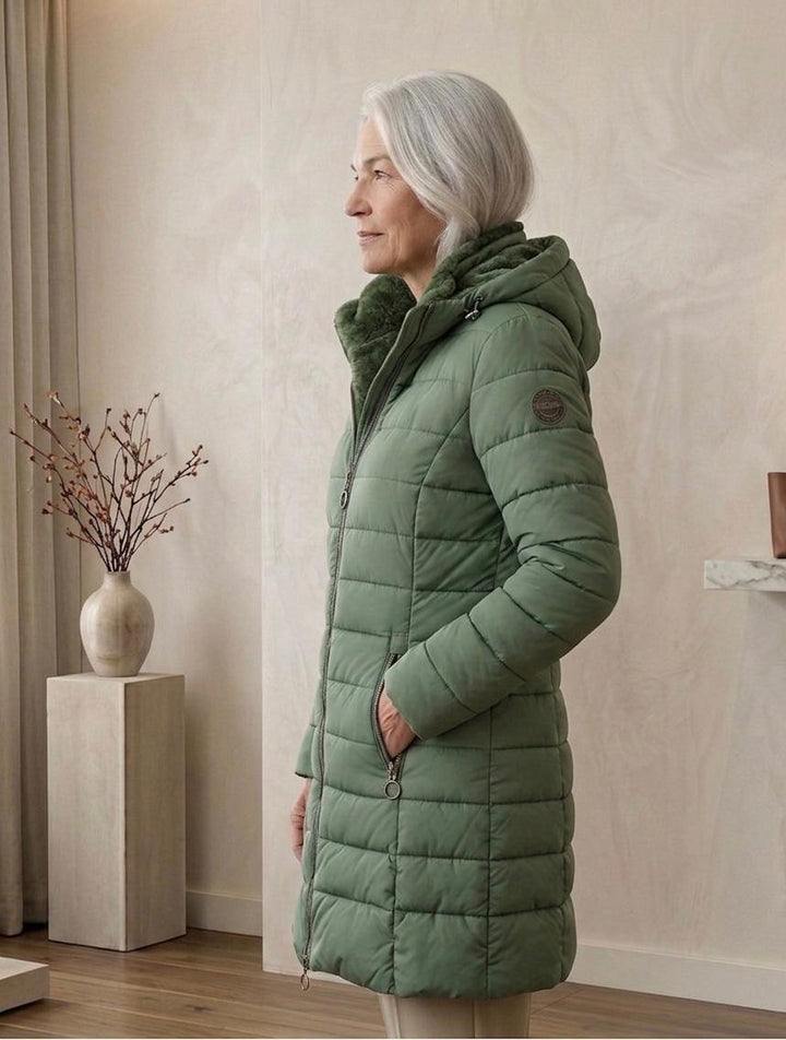 Quilted A-line winter coat in green, hooded full-zip design, side zip pockets