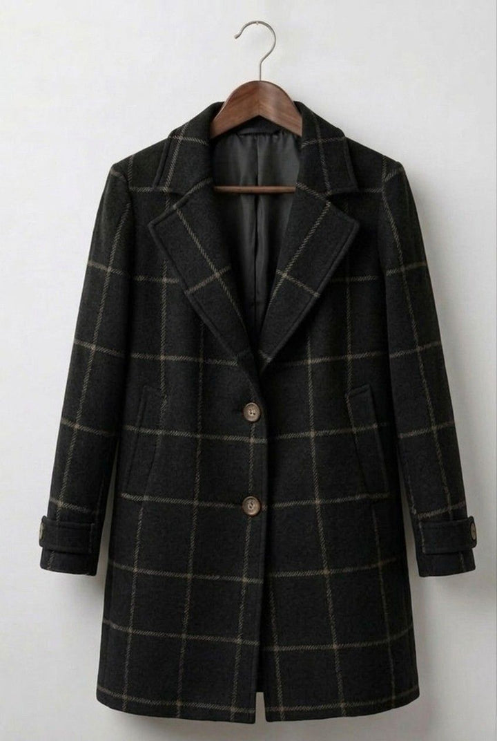 Black plaid tweed coat with notched lapels and two-button front