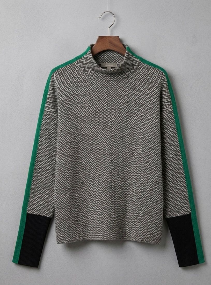 Women’s roll neck jumper, chevron knit with green contrast sleeves and black cuff bands