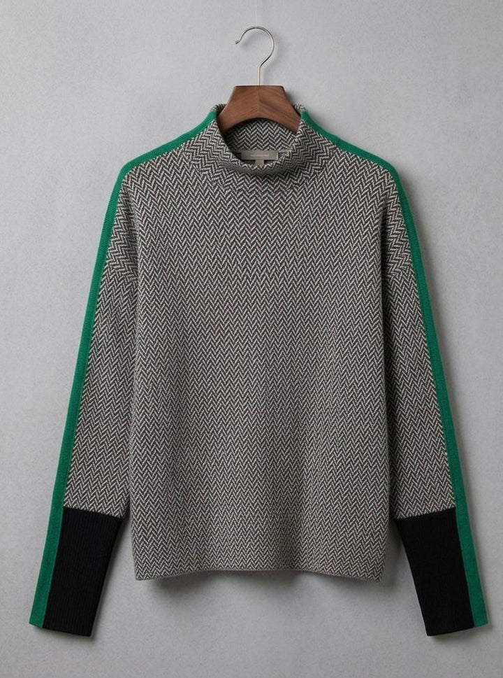 Women’s roll neck jumper, chevron knit with green contrast sleeves and black cuff bands