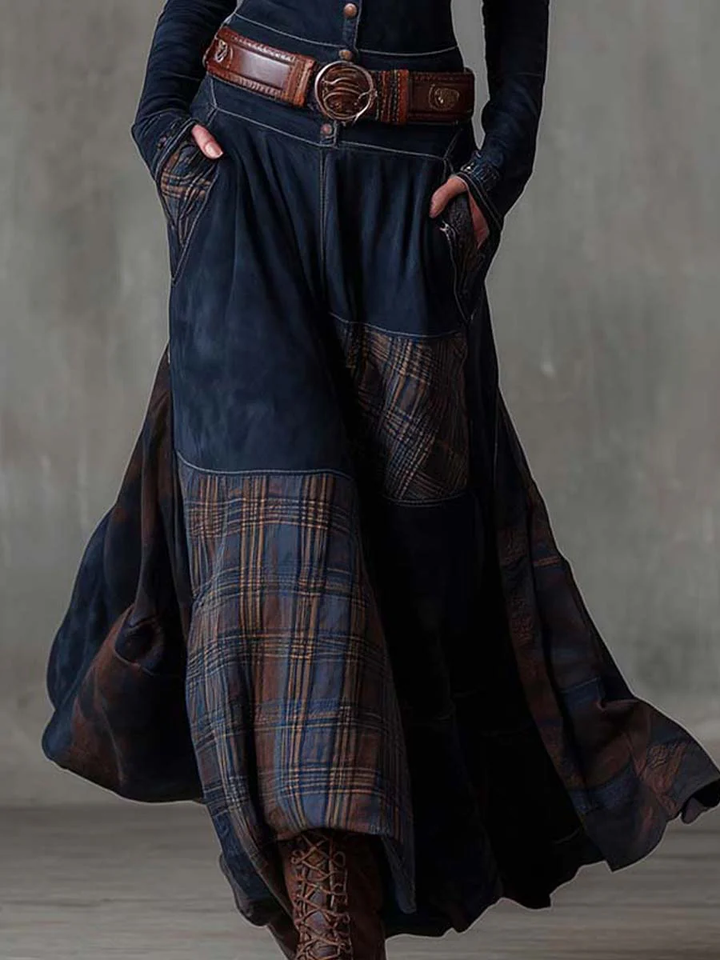 Navy faux suede maxi dress with wide skirt and plaid pocket panel details.