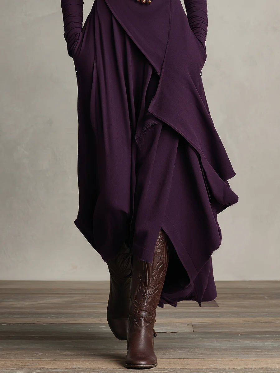 Purple asymmetric maxi dress with high neck, long sleeves, and layered skirt hem