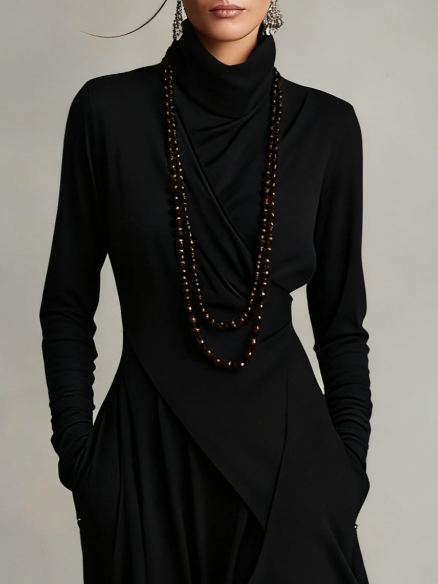 Black high-neck asymmetric maxi dress with crossover front and layered skirt
