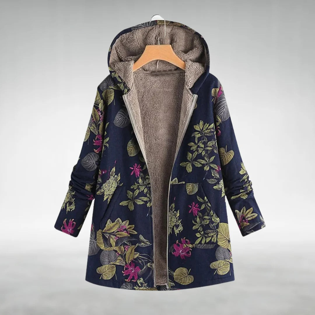 Floral fleece jacket on dark blue with green and pink leaves, gray lining, zip front