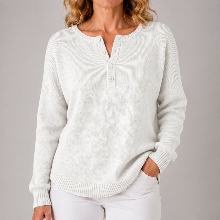 White classic button knit sweater with henley placket and ribbed cuffs