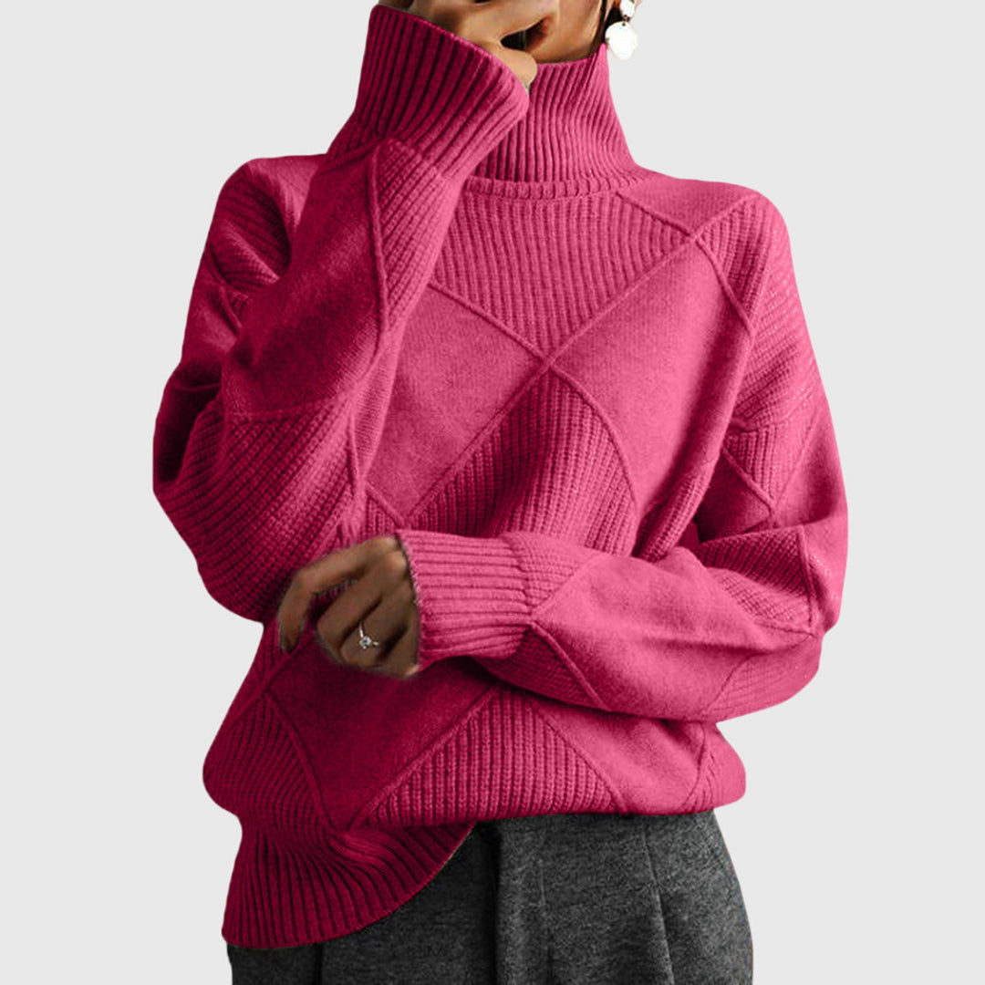 Rose turtleneck jumper on model with ribbed collar and diamond knit design
