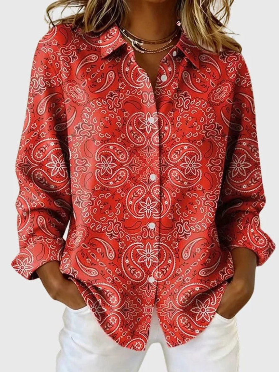 Red paisley print blouse with button-front V-neck and long sleeves