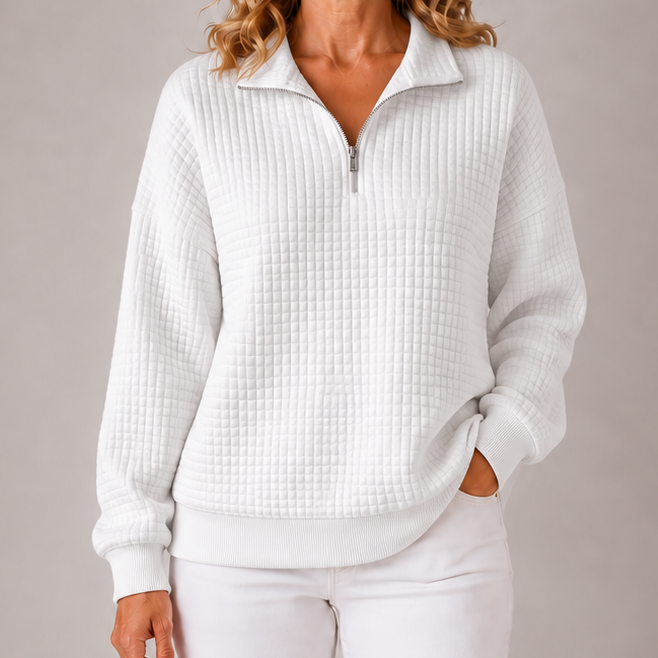 White quilted quarter-zip sweater with ribbed cuffs, hem, and stand collar