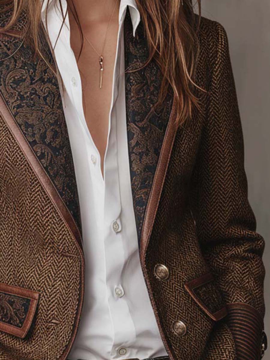 Brown tweed blazer front with dark printed lapels and metal button closure