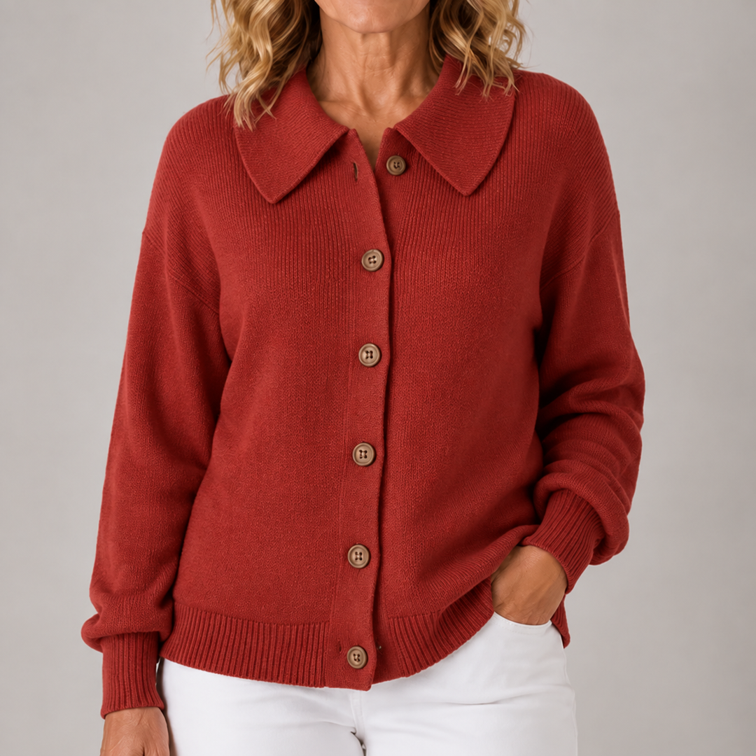 Red collared knit cardigan with button front, long sleeves, ribbed cuffs and hem