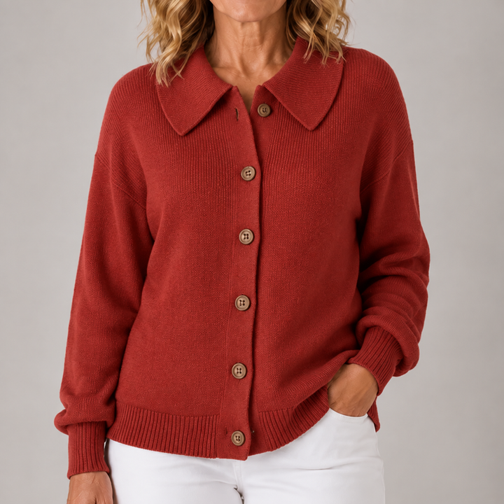 Red collared knit cardigan with button front, long sleeves, ribbed cuffs and hem