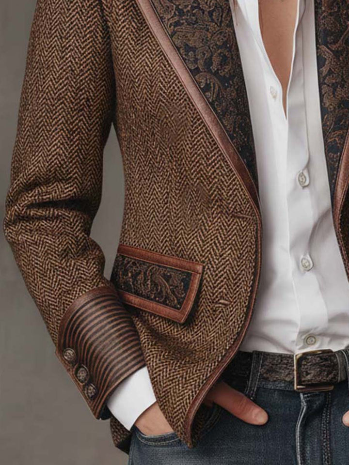 Brown tweed blazer sleeve and pocket detail with dark printed trim at cuff