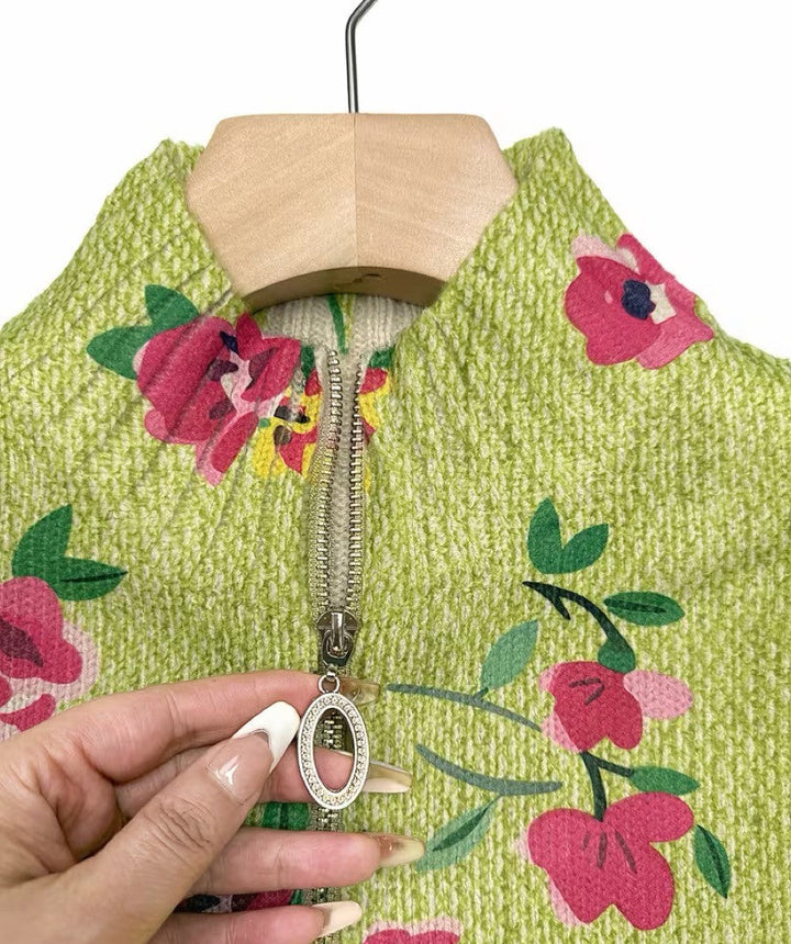 Lime green floral cardigan with zipper pull and textured knit