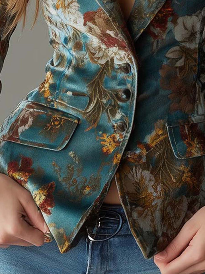 Teal floral velvet blazer front with decorative flap pockets and buttons