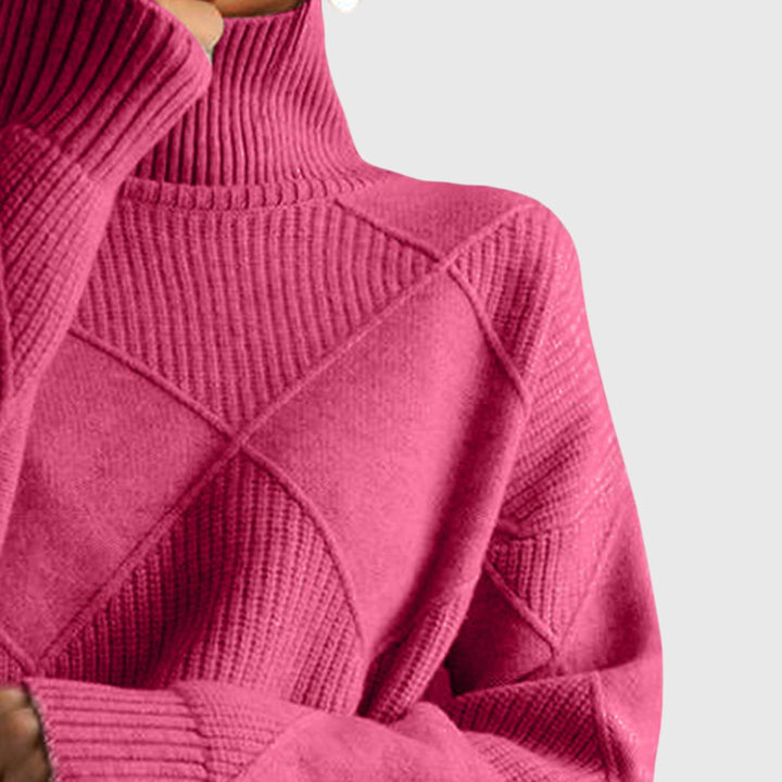 Rose turtleneck jumper neckline and diamond knit panels, ribbed cuffs and hem