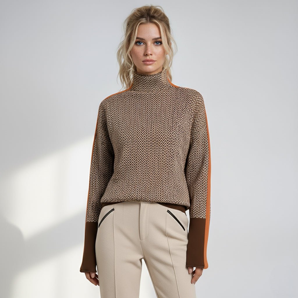 Women’s roll neck chevron jumper with brown base and orange-trimmed sleeve panels