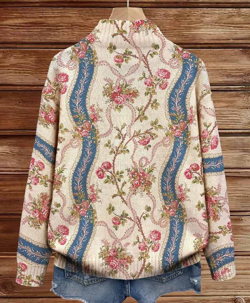 Back view zip cardigan, cream floral paisley with blue vertical trim and ribbed hem