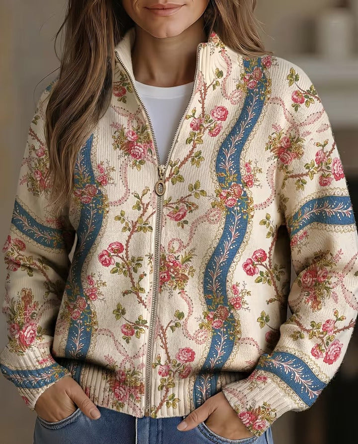 Paisley zip cardigan with cream floral print, blue vertical accents, full-zip front