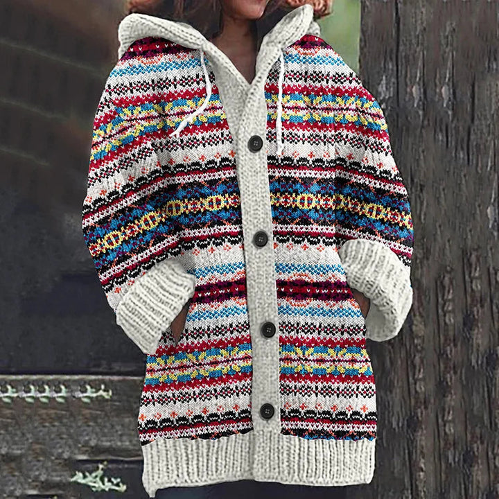 Hooded soft knit vest with striped multicolor pattern, button front, chunky cuffs.