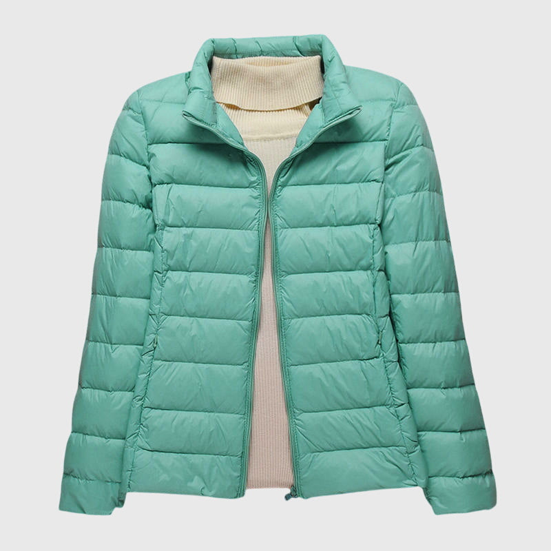 Ultralight jacket in green, stand collar and full-zip with quilted puffer panels