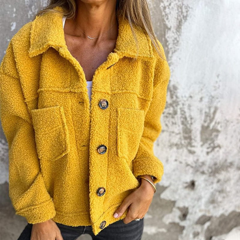 Yellow teddy jacket with button-up front, point collar, and flap chest pockets