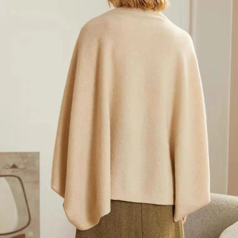 Back view of light beige merino wool shawl with flowing, wide drape