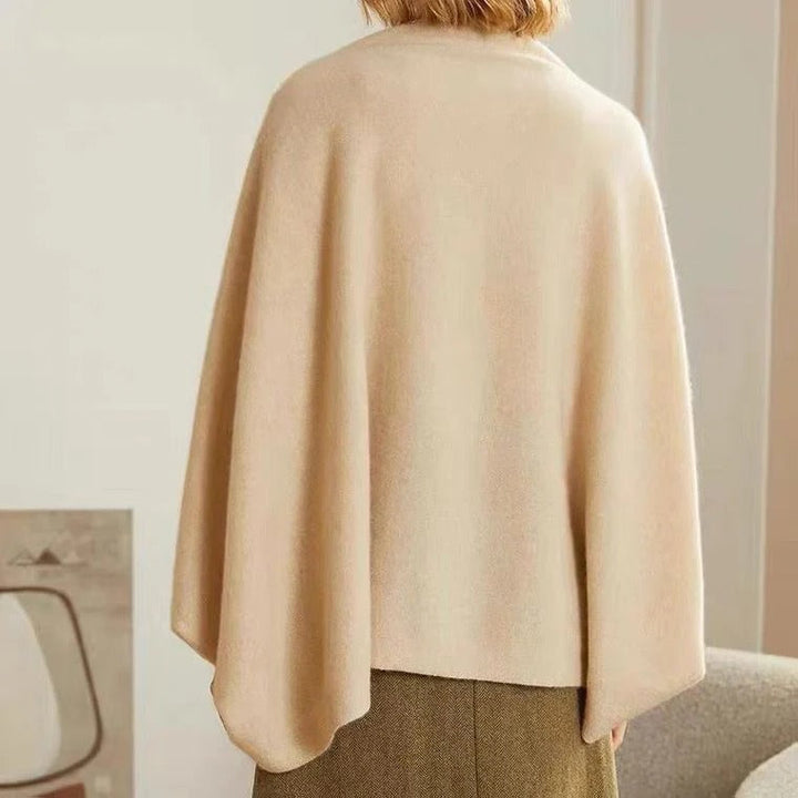 Back view of light beige merino wool shawl with flowing, wide drape